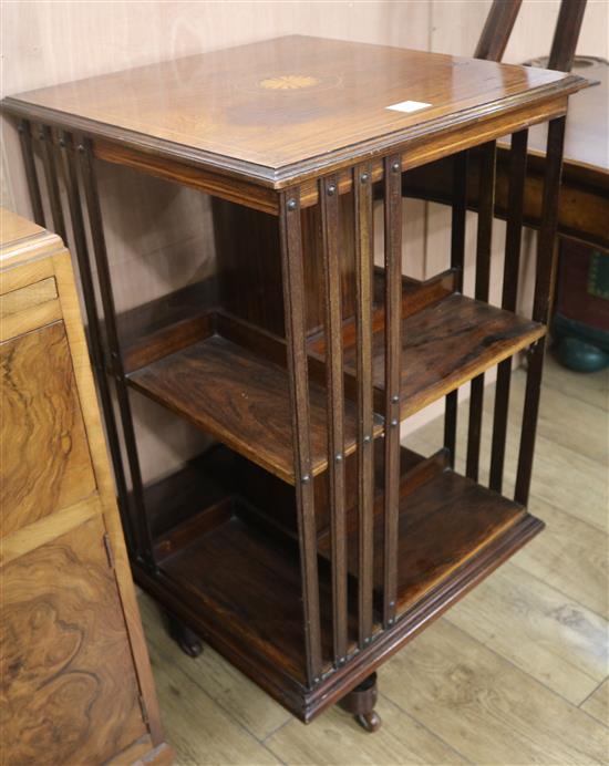 An inlaid rosewood revolving bookcase, H.90cm